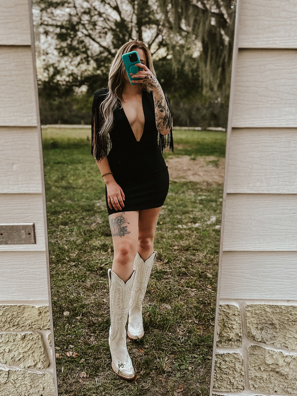 Dallas' Fringe Deep Neck Mini Dress